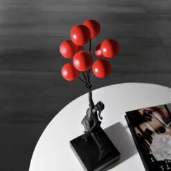 статуетка «Дівчинка з кулькою» за мотивами Бенксі