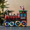 новогодняя карусель с подсветкой и музыкой, новорічна карусель з підсвіткою та музикою, рождественский поезд с Санта-Клаусом, різдвяний поїзд із Санта-Клаусом, декоративный поезд с рождественской музыкой, декоративний поїзд із різдвяною музикою, поезд с подсветкой для новогоднего декора, поїзд із підсвіткою для новорічного декору, новогодний экспресс с фигуркой Санты 6026-006, новорічний експрес із фігуркою Санти 6026-006, светящийся экспресс с музыкальным сопровождением, сяючий експрес із музичним супроводом, композиция рождественский поезд с огоньками, композиція різдвяний поїзд із вогниками, праздничная карусель поезд с музыкой, святкова карусель поїзд із музикою, поезд для рождественского украшения дома, поїзд для різдвяного прикрашання дому, игрушечный поезд с подсветкой для декора, іграшковий поїзд із підсвіткою для декору, украшение поезд с Санта-Клаусом, прикраса поїзд із Санта-Клаусом, новогодний экспресс для оформления интерьера, новорічний експрес для оформлення інтер’єру, новогодняя композиция с яркой подсветкой, новорічна композиція з яскравою підсвіткою